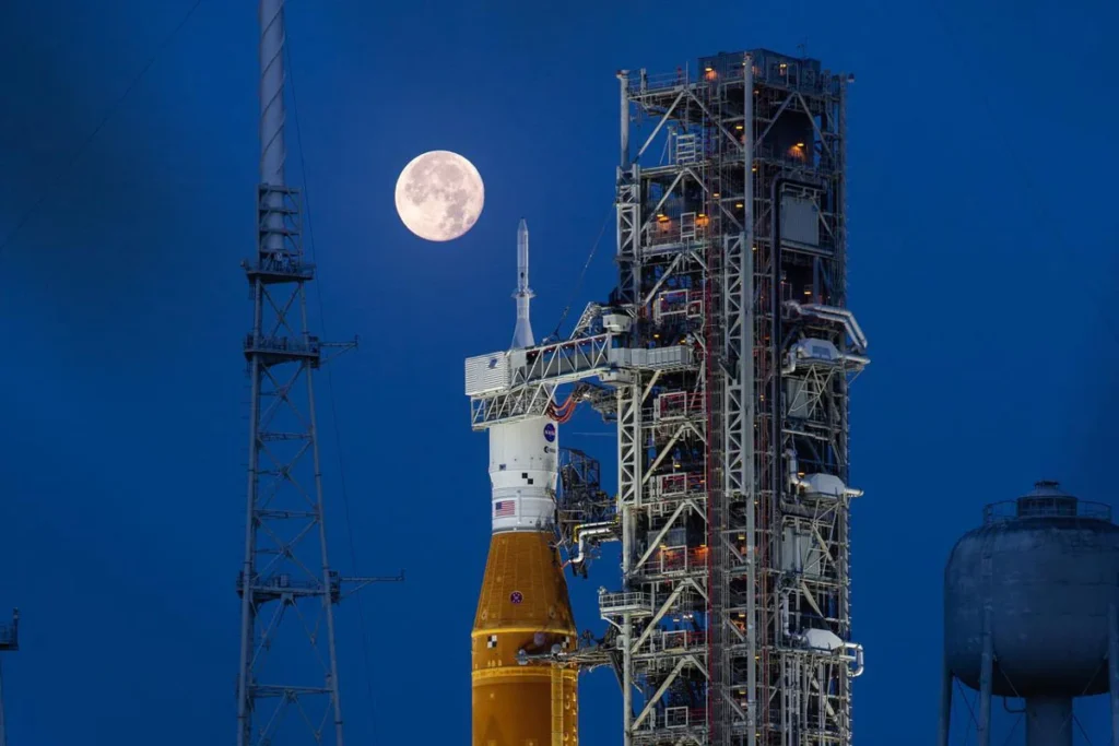 A full moon is in view from Launch Complex 39B at NASA’s Kennedy Space Center